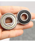 Heavy Duty Deep Groove Ball Bearing Set Sizes 6200 Through 6207 featuring ZZ DDU RS seals held in hand for electric motorcycles.