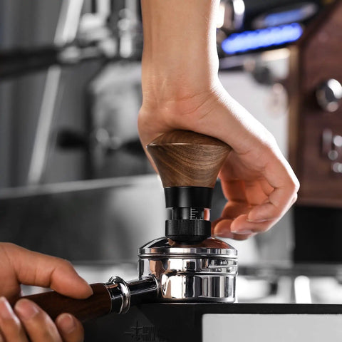 Person using 58.35mm Espresso Tamper With Spring Loaded Return And Adjustable Depth Pro Grade Stainless Steel Ripple Base For Espresso Machines Easy Grip Handheld Coffee Tool For Consistent Tamping