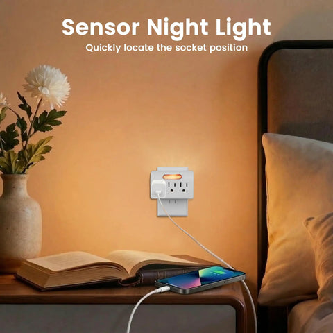 Plenty Of Power Now Super Slim 3 Plug Extender With Soft Led Guide Light 1875W Grounded Wall Splitter on bedside table with phone charger.