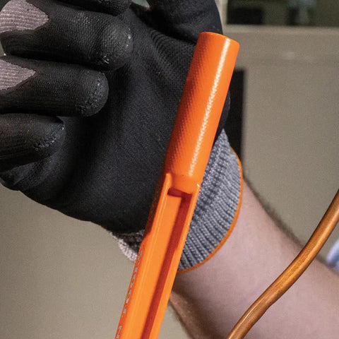 Close-up of hand using 3-In-1 Tube Bender for 1/4, 5/16, and 3/8 inch tubing bends soft copper in tight space