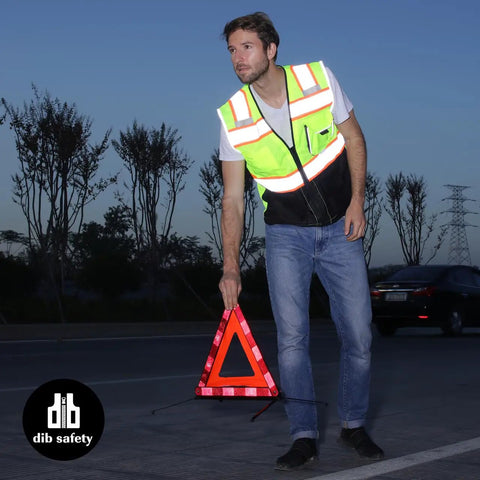 Man wearing High Visibility Reflective Safety Vest With Pockets And Zipper, ANSI Class 2 Mesh, 3M Reflective Tape, Yellow And Black, Large