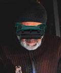 Heavy Duty Double Flip Welding Goggles With Impact Resistant Lenses And Smooth Flip Mechanism worn by a man in a workshop.