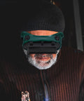 Top Shelf Industrial Welding Goggles Featuring Flip Up Dual Lenses And A Dang Comfy Adjustable Strap For Kickass Spark Shielding And Unmatched Impact Resistant Eye Care worn by a man with a beard.