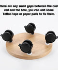 Four Pack One Inch Swivel Caster Wheels With Locking Brakes For Smooth Rolling Furniture Replacement on a circular wood base.