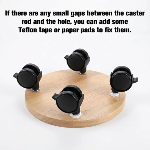 Four Pack One Inch Swivel Caster Wheels With Locking Brakes For Smooth Rolling Furniture Replacement on a circular wood base.
