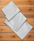 Rotating Washing Line Cover With Waterproof Zip Closure for all season outdoor use, laid flat showing silver high-density polyester fabric