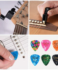 Guitar Tool Kit 31 Pieces For Pro Setup And Repair All In One Luthier Tools with winder, clippers, and colorful picks.