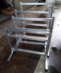 Heavy Duty Stainless Steel Gravity Conveyor Rollers With Adjustable Height Stand For Industrial Factories And Warehouses Rustproof And Waterproof, foldable frame.