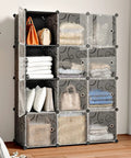 Multipurpose Portable Cube Storage Organizer 14 Inch By 14 Inch Black 4 By 3 Cube Cubbies For Clothes Toys And More Space Saving Closet And Toy Cabinet Durable Plastic Dresser Cubes filled with clothes and bags in a bedroom corner.