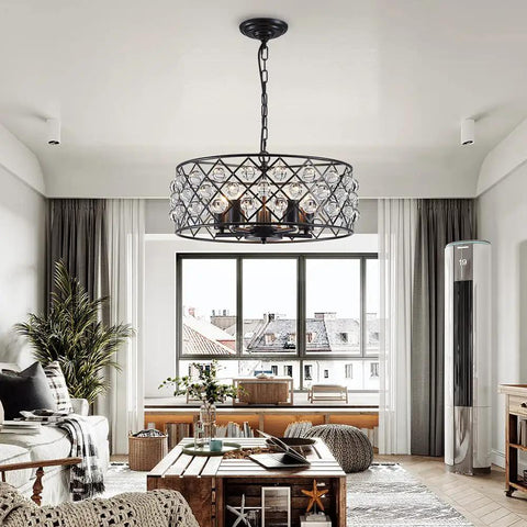 Five Light Drum Crystal Chandelier With K9 Crystals In Rustic Retro Style Ceiling Pendant For Kitchen Island, Dining Room Or Living Room, 9 Inch Height, 19 Inch Diameter, Modern Vintage Illumination hanging above a coffee table in a living room setting.