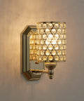 Two Pack Crystal Wall Sconce Lights With Champagne Finish Modern Minimalist Style Slick Polyhedral Crystal Shade For Bathroom Bedroom Living Room Bedside Fully Dimmable mounted on a wall, glowing.