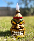 Outdoor Solar Tiki Head Statue With Dancing Flame Glow for garden yard, resin 8.74 inch figurine on grass
