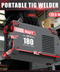 180 Amp DC Pulse TIG Welder With Cold Start And Large LED Display being carried in a workshop showing dimensions 10.2" x 6.1" x 14.2"