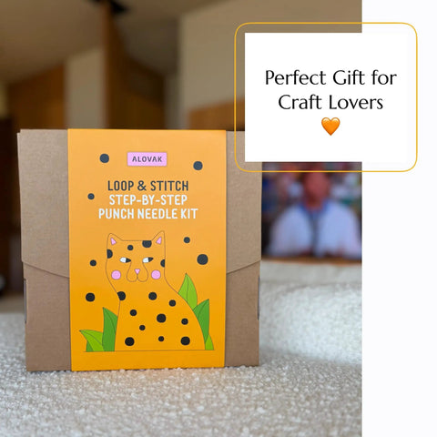 Product box of Beginner Punch Needle Kit With 14 Stitches Learn And Create A Simple DIY Embroidery Project For Adults.