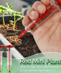 Handheld seed sower in use, plastic mini planter 12-pack for easy no mess even planting, tool for seedling garden beds.