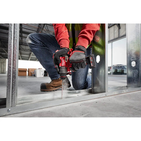 M12 Fuel Half Inch Hammer Drill Driver With Brushless Motor Ultra Lightweight used by worker on construction site