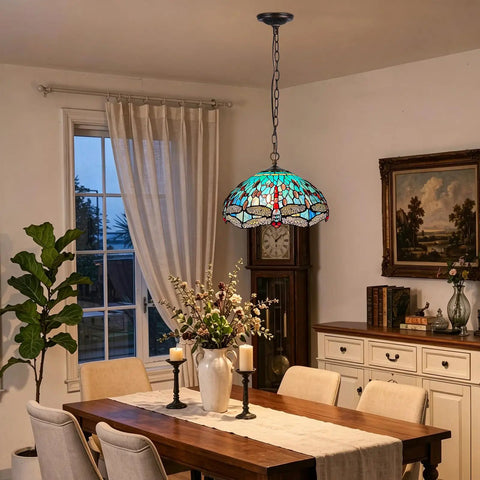 ARTZONE Antique Tiffany Pendant Light Fixture Stained Glass Hanging Lamp above a dining table with floral decor.