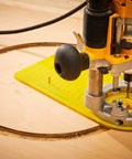 Pro Circle Cutting Router Jig, Polycarbonate Precision Tool for Woodworking in use for precise circle cuts on wood surface