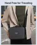 Large Electronic Organizer Travel Case With Hella Roomy Interior Rock Hard Shell Eva Protection For Chargers Cables And Tablets Up To 11 Inches Grab Bag Style With Shoulder Strap being carried by a person.