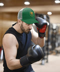 Man boxing in gym wearing Green Trucker Cap For Men And Women, Casual Sport Hat With Adjustable Buckle, Front Graphic Design