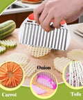 Front view of FANTEXY crinkle cutter with orange handle and stainless steel ridged blade cutting potatoes on a cutting board.
