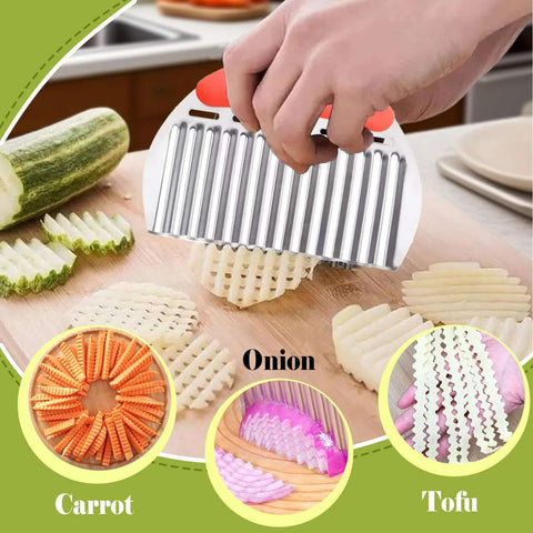 Front view of FANTEXY crinkle cutter with orange handle and stainless steel ridged blade cutting potatoes on a cutting board.