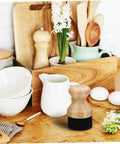 Straight Up Premium Wax Applicator For Cutting Boards Durable Bristle Brush For Mineral Oil Wood Polish Compact Kitchen Tool That Really Delivers The Goods You Need displayed on a kitchen counter with bowls and utensils.