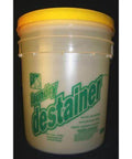 Plastic 5-gallon bucket with yellow lid labeled Sam Laundry Destainer Concentrate.