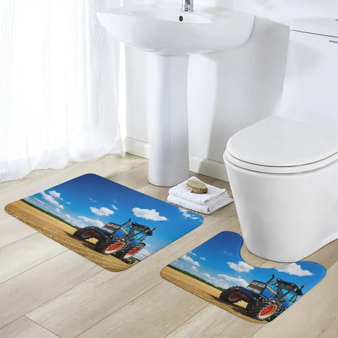 Ultra Soft Coral Velvet 2 Piece Bath Rug Set With Non Slip U Shaped Contour Toilet Mat And Fantasy Farm Tractor Print Absorbent Plush Bath Mats Machine Washable Home Decor Must Have displayed on bathroom floor with white sink and toilet.