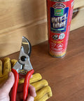 Toolbox Upgrade Odorless Penetrating Lubricant And Corrosion Inhibitor For Rusted Bolts Hinges And Locks, Multi Use Spray For Tools Electrical And Trailer Maintenance, Fast Acting Rust Busting Breaker For Automotive Farm And Marine Gear, red 400 mL can beside pruning shear