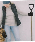 Woman holding a shovel with Shovel Handle Replacement Spade Handle for Gardening Tools, standing next to a dog