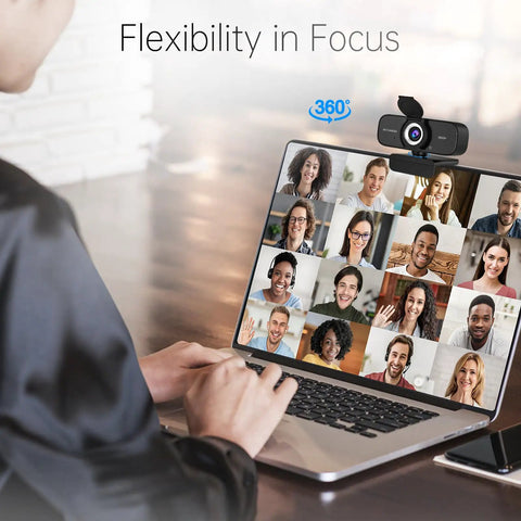 Sharp 1080P Hd Webcam With Noise Canceling Mic And Auto Light Correction Featuring Privacy Cover Wide Angle View Simple USB Plug and Play Ready For Laptop Desktop PC Mac used during a video call on a laptop.