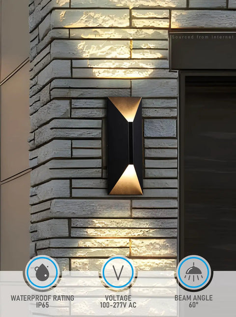Up And Down Dimmable LED Wall Light For Outdoor Use 100-277V IP65 Waterproof 14 Inch Slick Modern Porch Fixture 3000K Warm White CRI 90 Plus 10 To 100 Percent Dimming Ideal For Commercial Spaces Pack Of 2 mounted on brick wall.