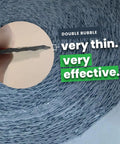 Double Bubble Reflective Foil Insulation Roll 48 X 75 Feet 300 Square Feet showing thin, effective material for attic insulation.