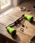 Upgrade Your Gear With This Carbon Fiber Fishing Reel Handle Crank Featuring Double Ergonomic Curved TPE Knobs For Superior Non Slip Grip On Any Baitcasting Setup Perfect For Pond Fishing Adventures, green carbon fiber reel handle on wood table