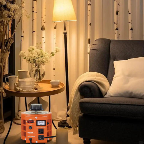 Built Tough 2000VA AC Voltage Regulator Step Up Down Transformer 110V Input in cozy living room setting with lamp and flower vase.