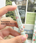 Close-up of a Four Piece Erasable Gel Pens With Retractable Cat Cartoons 0.5mm Black Ink Green Cat Pattern being held.