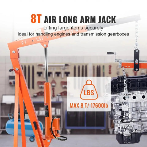 8 Ton Long Ram Hydraulic Electric Engine Hoist With Air Assisted Pump And Single Piston Manual Pump lifting a heavy engine in workshop.