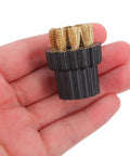 Ten Piece Steam Cleaner Brush Head Replacement Kit featuring heavy duty copper and steel bristles in hand for scrubbing grime.
