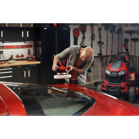Man using V20 Cordless Buffer Polisher for Car Detailing, 10 Inch Orbital Polisher with Splash Guard, garage background