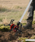 Six Claw Deep Plow Cultivator Wheel Attachment in action on soil, attached to a mower, with visible claws and red wheel.