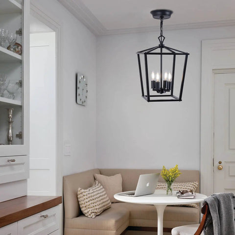 Square Metal Farmhouse Pendant Light Chandelier For Kitchen Island And Foyer hanging above dining area.