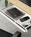 Under Desk Sliding Drawer With Smooth Ball Bearing Rails For Sit Stand Tabletops pull out organizer with notebooks and pens.