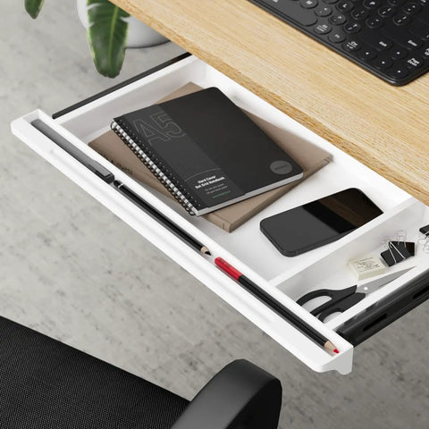 Under Desk Sliding Drawer With Smooth Ball Bearing Rails For Sit Stand Tabletops pull out organizer with notebooks and pens.