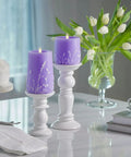 Lavender Glow Flameless Moving Flame Goblet Candle With LED Pillar 4 By 4.5 Inch Embossed Floral Print on dining table