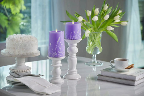 Lavender Glow Flameless Moving Flame Goblet Candle With LED Pillar 4 By 4.5 Inch Embossed Floral Print on dining table
