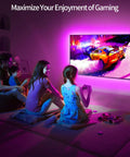 Family enjoying gaming with LED Backlight for 32 To 45 Inch TVs 9.84 Feet RGB Strip Lights With Remote Bluetooth App Control Music Sync USB Powered Ambience Lighting for Bedroom Gaming Room Home Theater Decor