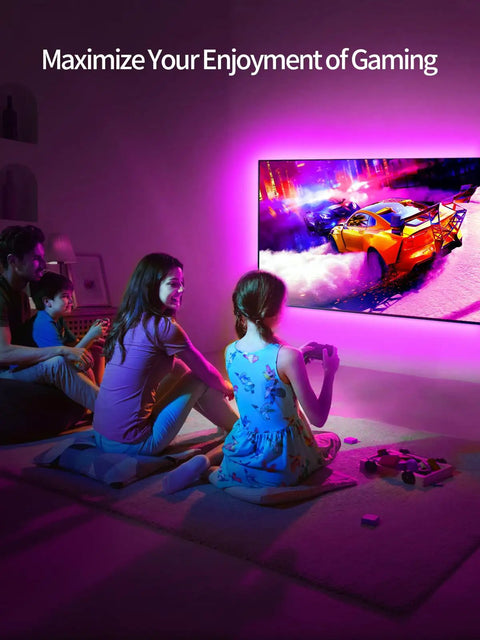 Family enjoying gaming with LED Backlight for 32 To 45 Inch TVs 9.84 Feet RGB Strip Lights With Remote Bluetooth App Control Music Sync USB Powered Ambience Lighting for Bedroom Gaming Room Home Theater Decor