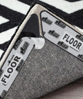 Close-up of Rug Gripper Pads 16 Pack Reusable Double Sided Stickers To Keep Area Rugs Flat And Secure On Hardwood Tile And Laminate Floors