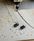 U Shaped Plastic Furniture Foot Protectors Set 20 Pcs Easy Install Chair Leg Floor Glides on wood surface with sawdust